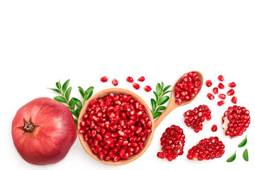 Pomegranate isolated on white background with clipping path and full depth of field. Top view with copy space for your text. Flat lay