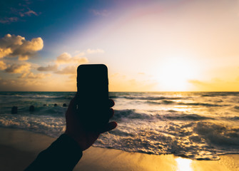 sunset beach sea silhouette mobile phone water cell sky ocean sunrise landscape summer coast dusk cloud © Alberto GV PHOTOGRAP