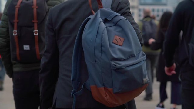 Crowd of pedestrian commuters in London inception style move in slow motion. Clip 22a