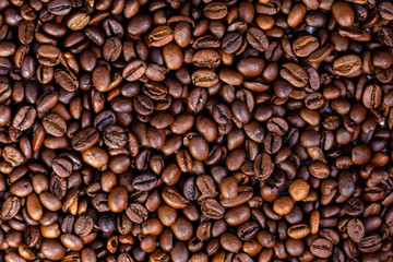 coffee beans are scattered on the table and take up all the space