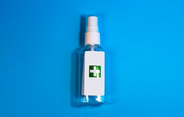 Pharmacy for disinfection of hands and surfaces on a blue background with copy space. Infection protection. Coronavirus