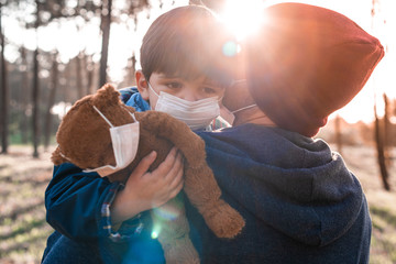 Father and son using air masks