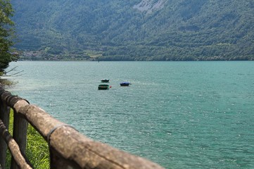 Stationary boats on the lake of santa croce