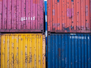 stack of multicoloured shipping containers