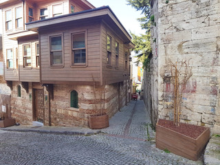 Fototapeta na wymiar amazing combinations of styles in architecture, wood and stone, on the narrow streets of European cities