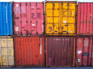stack of multicoloured shipping containers