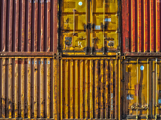 Obraz premium stack of multicoloured shipping containers