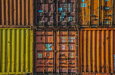 stack of multicoloured shipping containers