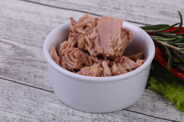 Tasty canned tuna fish in the bowl