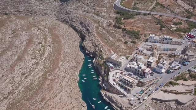 Aerial Drone Shot of a Natural Valley along the Coast of the Mediterranean Island, Wied iz-Zurrieq, Malta