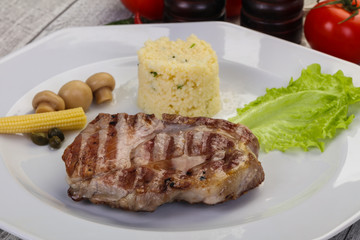 Grilled pork neck steak
