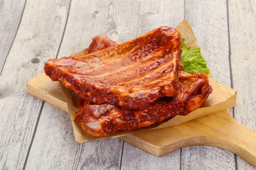 Raw marinated pork ribs