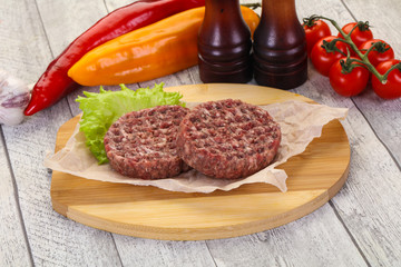 Raw burger cutlet