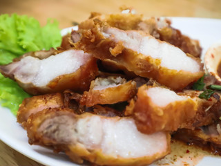 Sliced Crispy Pork Belly and dipping sauce.