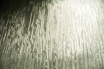 Abstract background. Closeup of glass surface