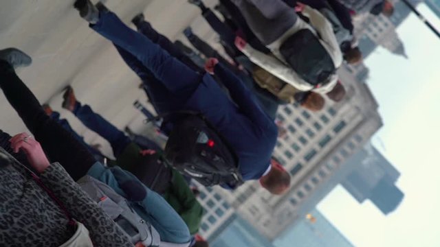Crowd of pedestrian commuters in London inception style move in slow motion. Clip 23b