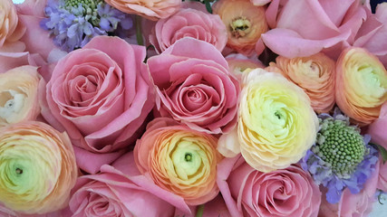 Obraz na płótnie Canvas roses and ranunculus