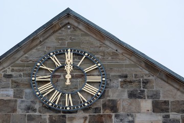 Clock face showing twelve o clock 
