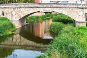 Girona, Spain, August 2018. A magnificent view of the overgrown old moat at the fortress wall of the old city.