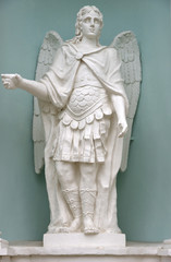 Fototapeta na wymiar Archangel Michael. Sculpture in niche of southern façade of Demetrius Cathedral of Spaso-Yakovlevsky Monastery (1801), Monastery of St. Jacob Saviour, situated to left from Rostov kremlin, it was fou