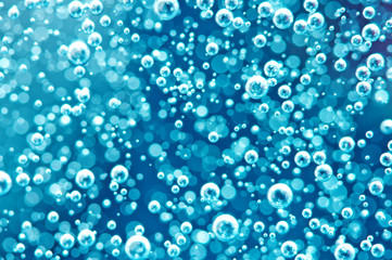 Macro Oxygen bubbles in water on blured background, concept such as ecology