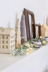 Closeup, angled view of neutral wooden Christmas holiday home decoration.