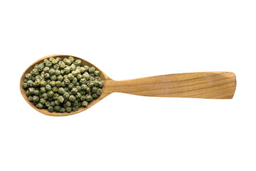 green peppercorn seeds in wooden spoon isolated on white background. spice for cooking food, top view.