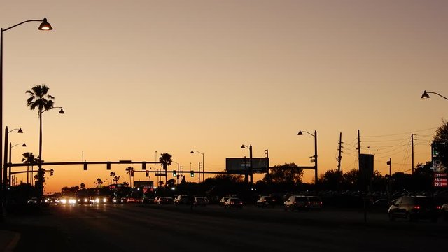 Beautiful Sunset Sky Palm Trees No Clouds With Rush Hour Trafffic