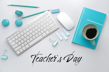 PC keyboard, mouse, cup of coffee and stationery on light background. Teacher's Day celebration