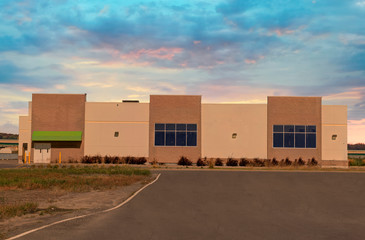 Unoccupied generic store, business or professional office space. Sunny summer day.