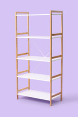 Empty shelving unit on color background