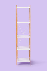 Empty shelving unit on color background