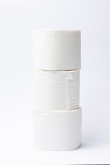 Symbol image for corona crisis panic buying / hoarding. Pile of toilet paper on white Background, with copy space.