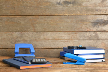 Set of school supplies on wooden table