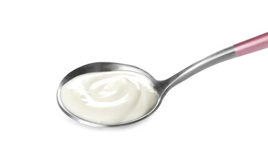 Spoon with tasty cream cheese on white background