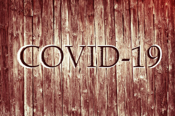 Abstract old gray wooden with covid-19 sign