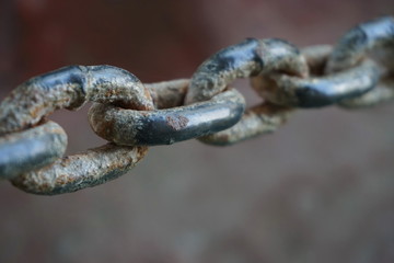 Close up of Steel chain, Rusty chains. Selective focus