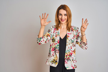 Young caucasian business woman wearing spring floral jacket suit over isolated background showing...