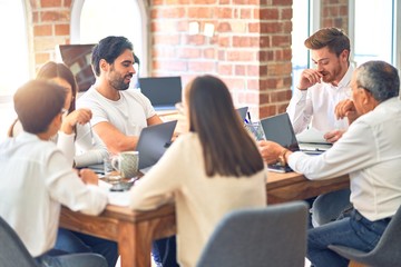 Fototapeta premium Group of business workers working together at the office