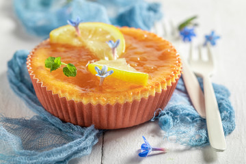 Homemade and tasty lemon cheesecake with yellow jelly