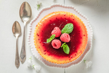 Yummy and sweet raspberry cheesecake made with fresh berries