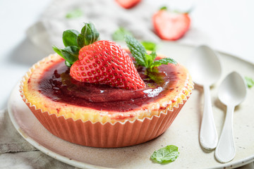 Red and sweet strawbery cheesecake with red jelly