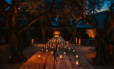 Romantic candles on the wooden table