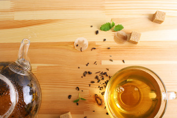 tea cup teapot wooden background