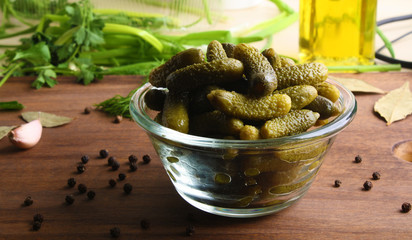 cucumber cornichons cuke on a wooden background cooking