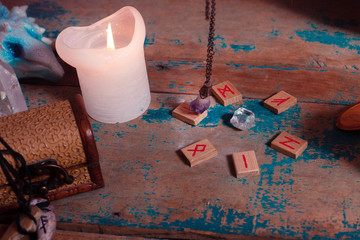 Fortune telling with a pendulum and runes - obrazy, fototapety, plakaty