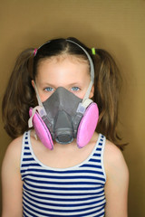 Little Girl With Respirator Mask On 