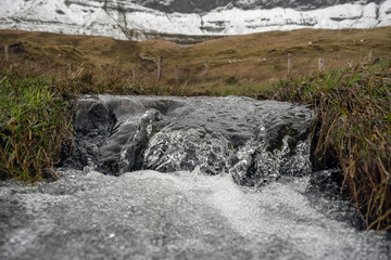 Small river cascade, Frozen motion, natural abstract texture background.