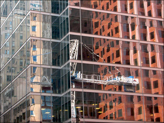 Toronto, Ontario / Canada - June 27 2008 : Reflection of the image of the crane on the window
