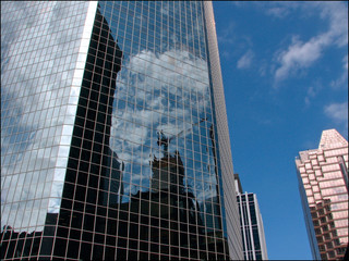 Toronto, Ontario / Canada - June 11 2008 : Reflection of the image of the crane on the window